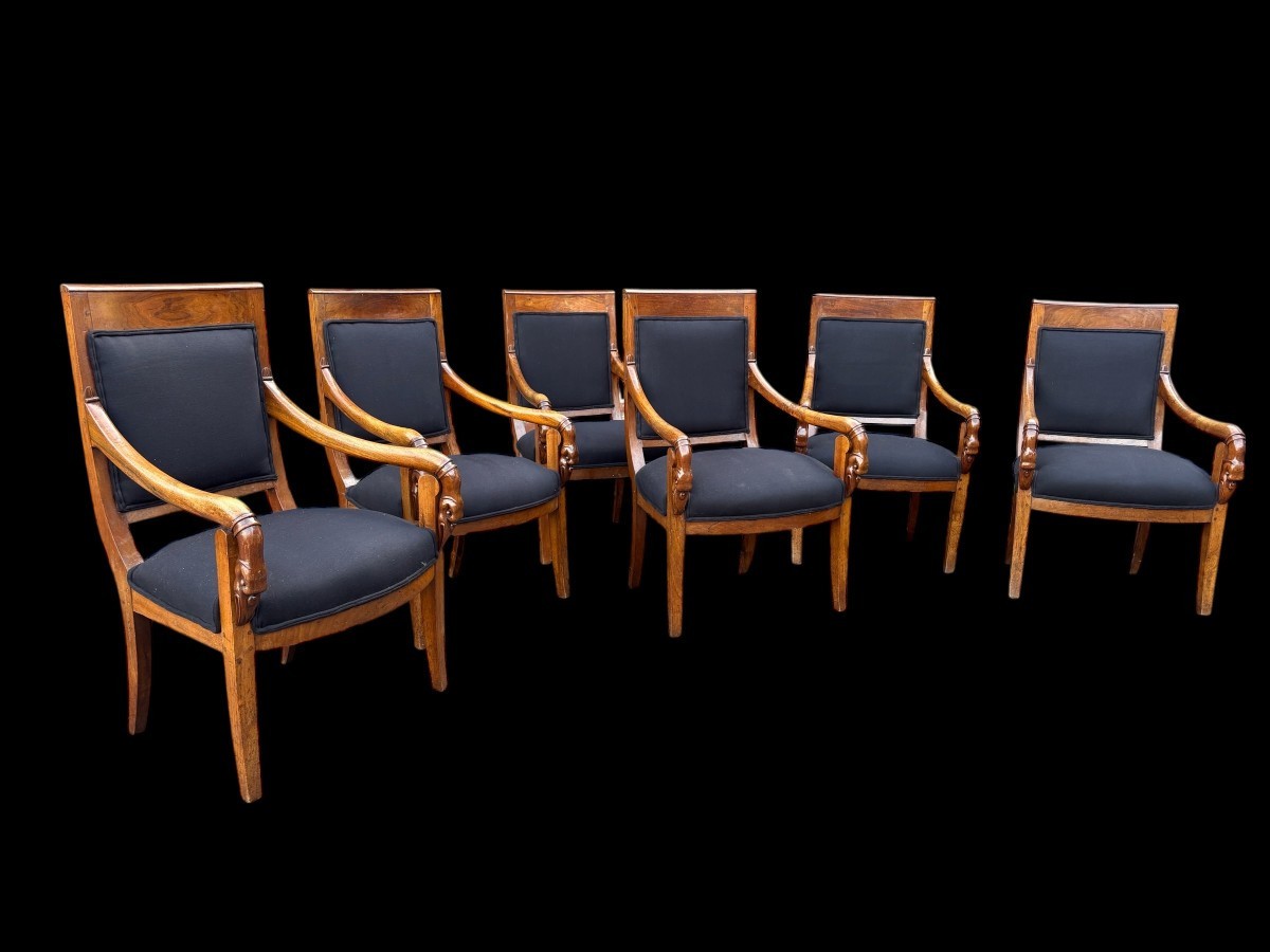 Set of 6 Charles X armchairs, 19th century Beautiful set of fruitwood armchairs decorated with swan-neck armrests. The armchairs have recently been reupholstered in black fabric and are therefore in very good condition.