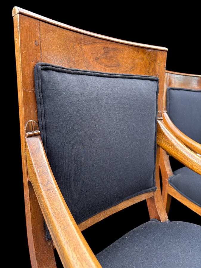 Set of 6 Charles X armchairs, 19th century Beautiful set of fruitwood armchairs decorated with swan-neck armrests. The armchairs have recently been reupholstered in black fabric and are therefore in very good condition.