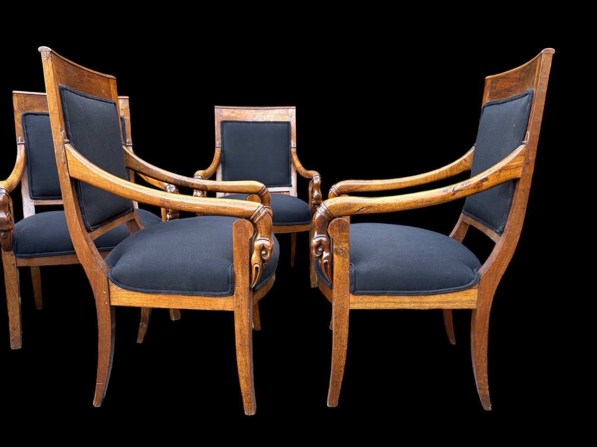 Set of 6 Charles X armchairs, 19th century Beautiful set of fruitwood armchairs decorated with swan-neck armrests. The armchairs have recently been reupholstered in black fabric and are therefore in very good condition.