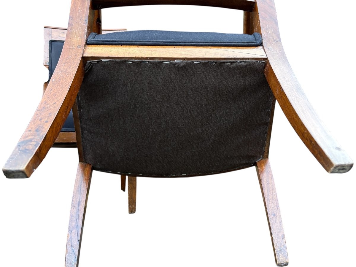 Set of 6 Charles X armchairs, 19th century Beautiful set of fruitwood armchairs decorated with swan-neck armrests. The armchairs have recently been reupholstered in black fabric and are therefore in very good condition.