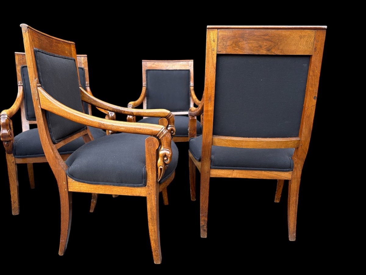 Set of 6 Charles X armchairs, 19th century Beautiful set of fruitwood armchairs decorated with swan-neck armrests. The armchairs have recently been reupholstered in black fabric and are therefore in very good condition.