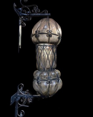 Special large outdoor lamp / lantern in wrought iron and curved glass 1930 ( 126 cm ) Very decorative lantern with curved glass in a wrought iron frame. Lantern needs a small restoration to an iron edge at the top , the glass is in very good condition.