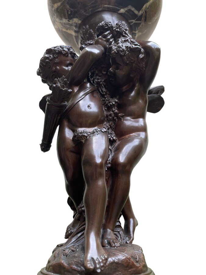 Special Sculpture / centrepiece in bronze by A.Moreau 19th century Very finely detailed Tassa representing a putti and an elf in bronze holding a coupe in marble. The sculpture is in very good condition , has 2 small holes in the bronze under the coupe 