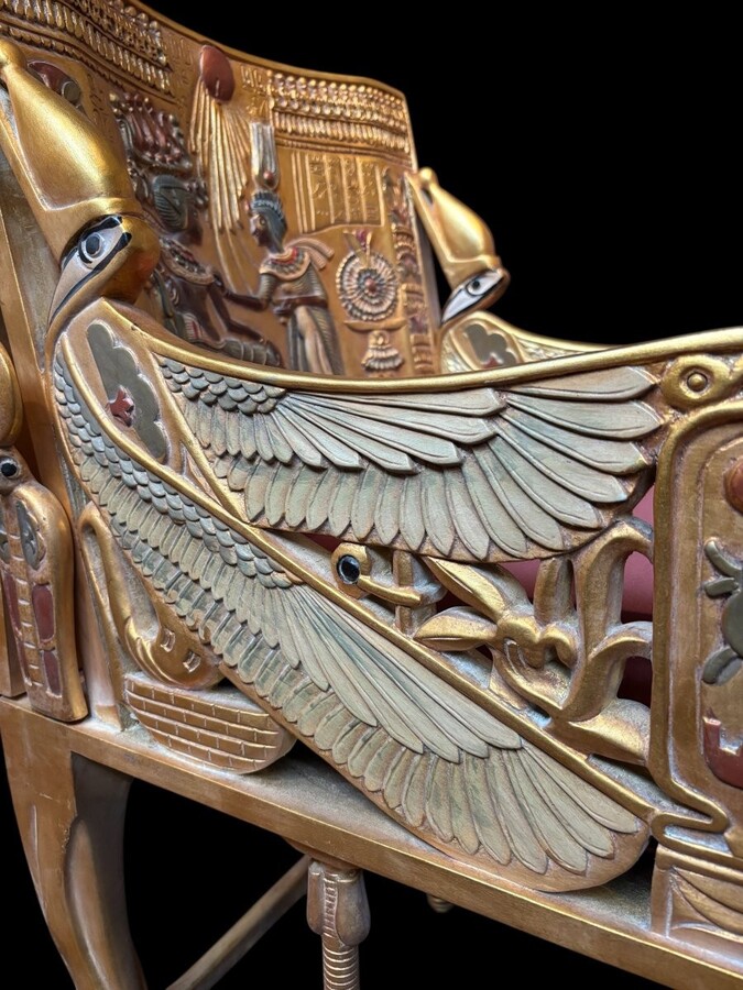 Tutankhamun throne in gilded and patinated wood 21st C. Very decorative gilded wood throne with silk fabric cushion ‘after’ The throne, from the tomb of Tutankhamun.Tutankhamun, pharaoh of ancient Egypt.